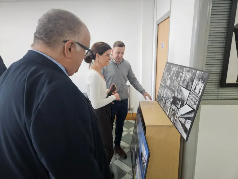Icelandic Ambassador to the UK, Thordis Kolbrun Gylfadottir, starts her tour of the modern Grimsby Fish Market by taking in images of the old auctions, with operations director Danny Payne, back, and chief executive Andrew Oliver.