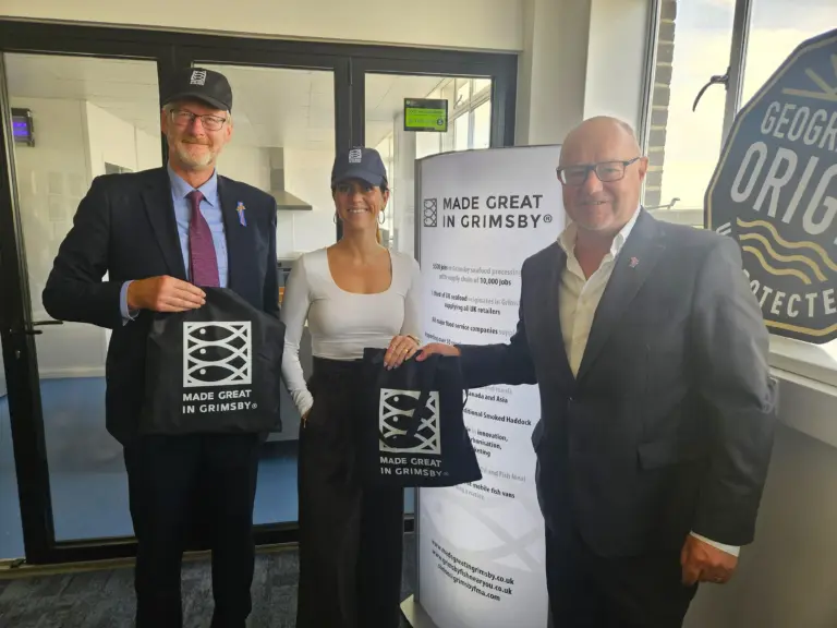 GFDG chair Simon Dwyer, right, presents gifts to both Icelandic Ambassador to the UK, Thordis Kolbrun Gylfadottir, and retiring Grimsby-area Conul, Jonathan Goolden, after the lunch at Alfred Enderby Ltd, where Mr Dwyer briefed the Ambassador on the strength of the cluster and the Made Great in Grimsby brand's presence. 